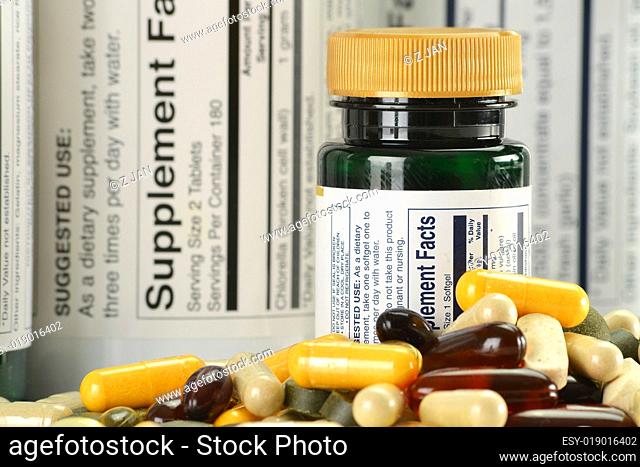 Composition with dietary supplement capsules and containers