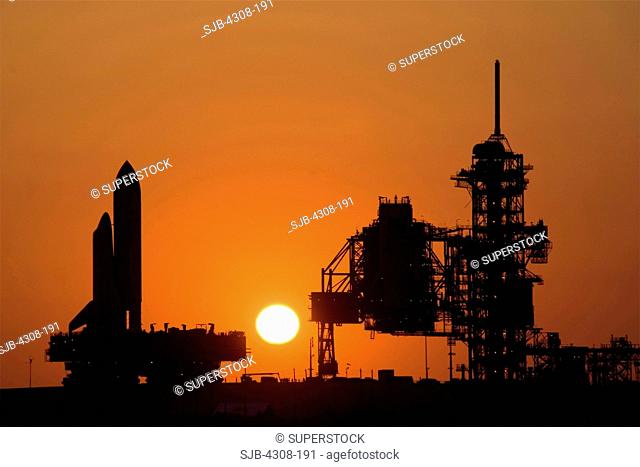Silhouette of Space Shuttle Discovery and Launch Pad