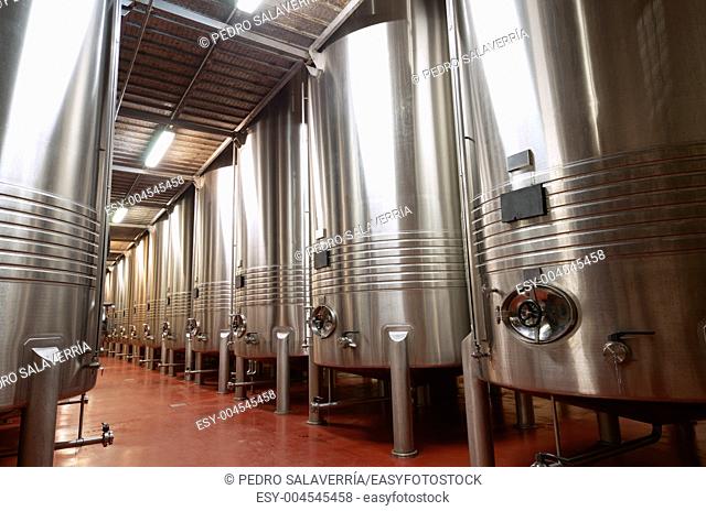 huge metal reservoirs for the fermentation of wine