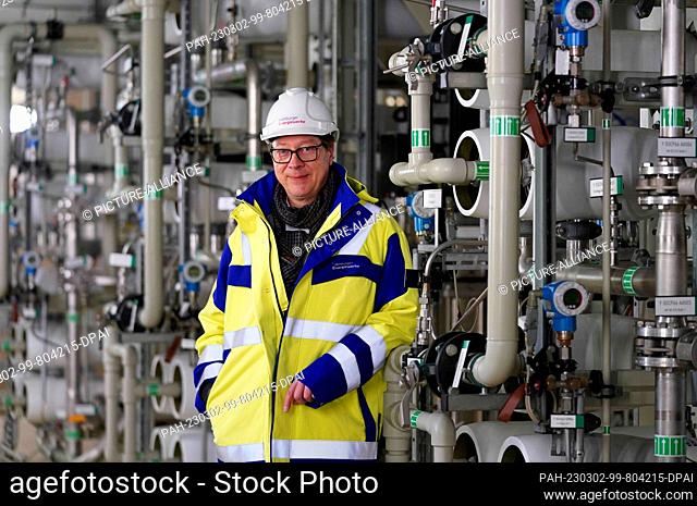 02 March 2023, Hamburg: Christian Heine, spokesman for the management of Hamburger Energiewerke, stands in the water treatment and laboratory building on the...