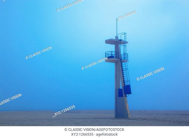 Lifeguard tower on Playamar beach in off-season on foggy day  Torremolinos, Malaga Province, Costa del Sol, Spain