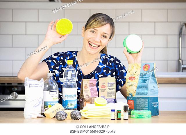 Woman using eco cleaning products