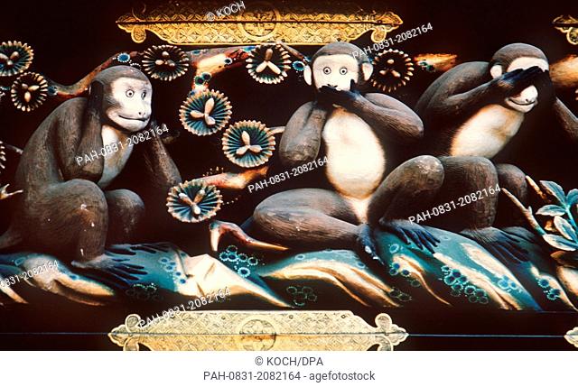 View of wood carvings of the famous monkeys emblematising the worldly wisdom ""Neither hearing, saying or seeing anything"" at the Yeasu Temple in Nikko, Japan
