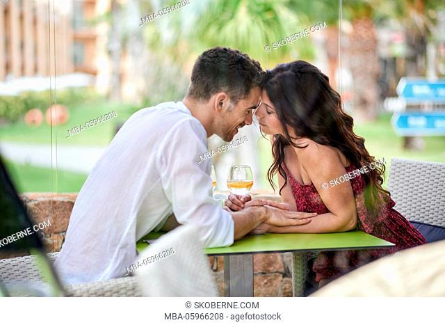 young couple in love in the restaurant