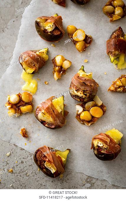 Figs with brie wrapped in ham with macadamia nut caramel