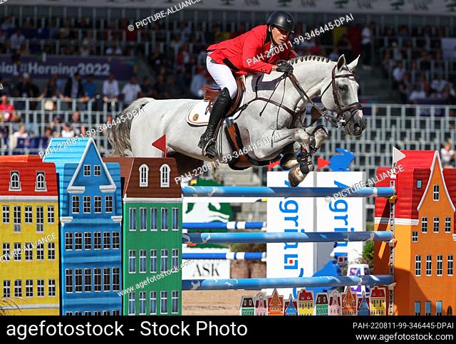 10 August 2022, Denmark, Herning: Equestrian sport: World Championship, Show Jumping. Show jumper Gregory Wathelet (Belgium) rides Nevados S
