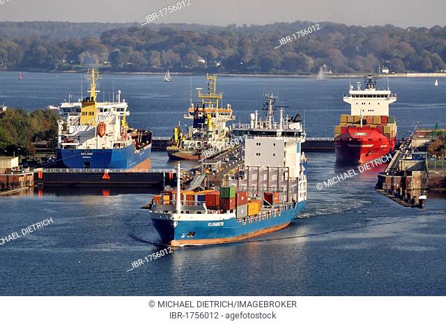 Shipping container ships at Holtenau lock, Kiel Canal, Kiel, Schleswig-Holstein, Germany, Europe
