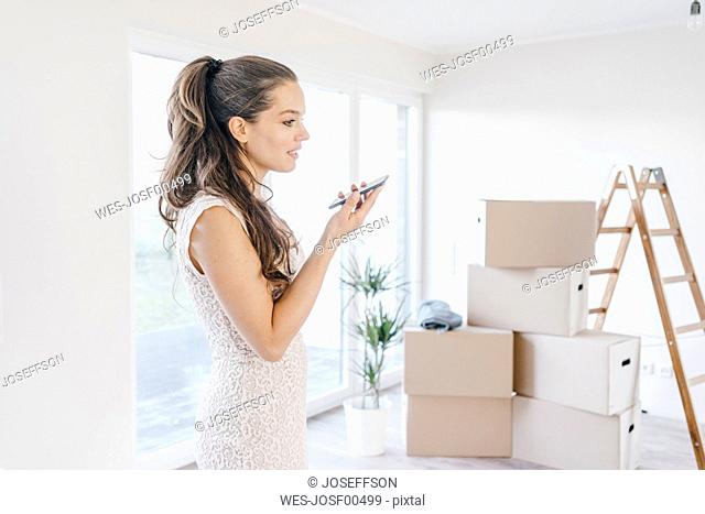 Mature businesswoman moving into her new home