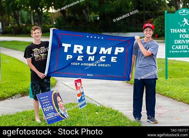 Supporters during U.S. Election Day on November, 3 2020 in Pompano Beach, Florida. Credit: Maurice Ross/The Photo Access
