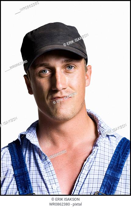 Farmer wearing a ball cap