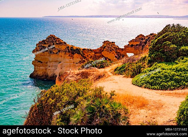 Rocky coast Praia dos três irmãos, beach near Alvor, Algarve, District Portimão, Portugal, Europe