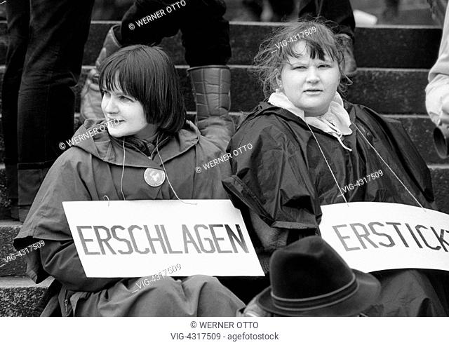 Eighties, black and white photo, people, peace demonstration, Easter marches 1983 in Germany against nuclear armament, two young women presenting a protest sign