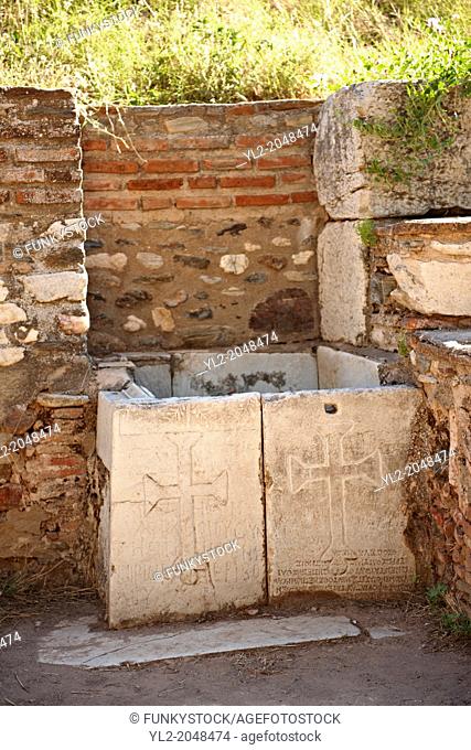 Early Christian Byzantine Basin with Crosses in the Byzantine shop area next to the gymnasium of Sardis. Sardis archaeological site, Hermus valley, Turkey