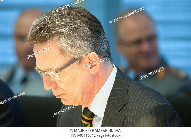 German Defence Minister Thomas de Maiziere attends a special meeting of the defence committee on controversies concerning his handling of a failed...