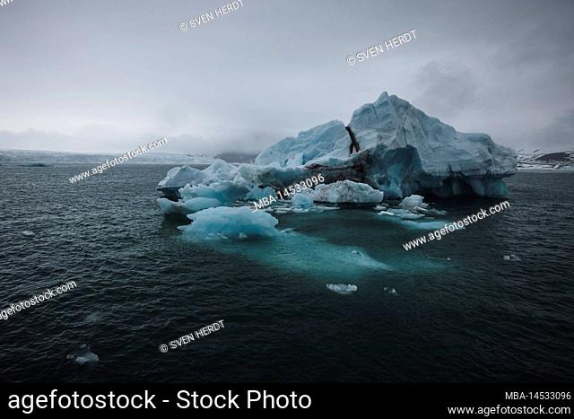An iceberg drifts off the coast near Spitsbergen