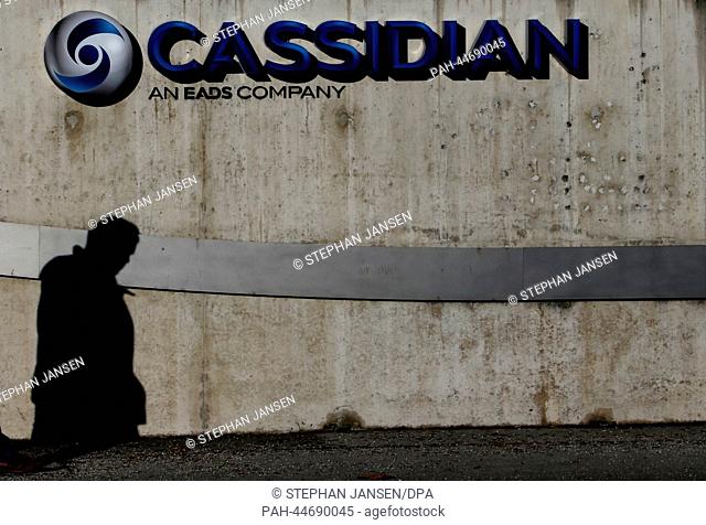 View of the shadow of a person at the headquarters of armaments manufacturer Cassidian in Unterschleissheim, Germany, 10 December 2013