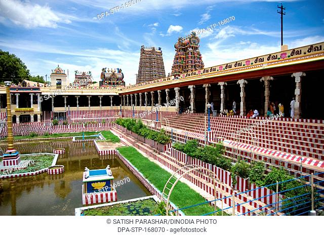Golden lotus tank and gopurams in sri meenakshi temple , Madurai , Tamil Nadu , India