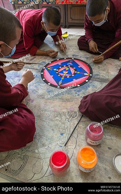 Young monks from Shechen Tennyi Dargyeling Monastery create a sand mandala. Kathmandu. Nepal., Credit:Oscar Dominguez / Avalon