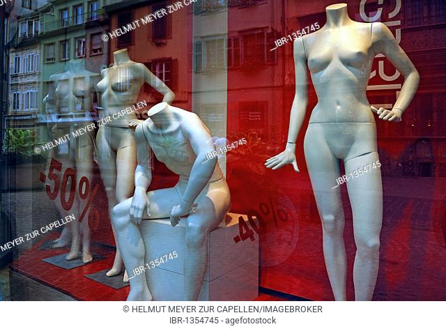Naked white mannequins in a fashion shop for a clearance sale, Colmar, Alsace, France, Europe