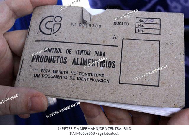 A check book for the rationed purchase of subsidized groceries for Cubans photographed in Trinidad, Cuba, 16 April 2013. Rationed amounts of meat, coffee, sugar