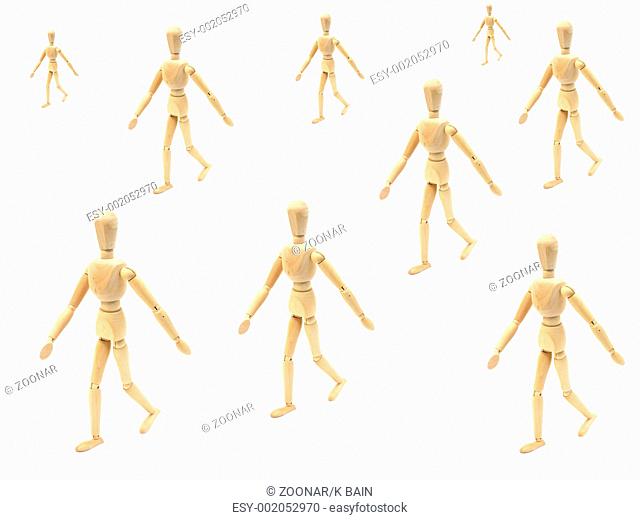 A wooden manikin isolated on a white background