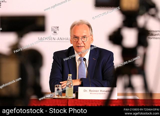 05 August 2021, Saxony-Anhalt, Magdeburg: Minister President Reiner Haseloff (CDU) speaks at the press conference in the State Chancellery on the decision of...