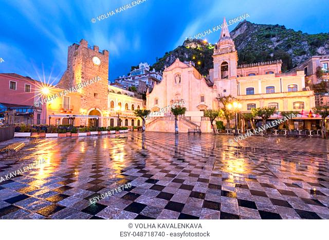 Belvedere of Taormina and San Giuseppe church on the square Piazza IX Aprile in Taormina at rainy night, Sicily, Italy