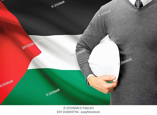 Engineer with flag on background - Palestine