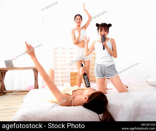 Friends play in the bedroom