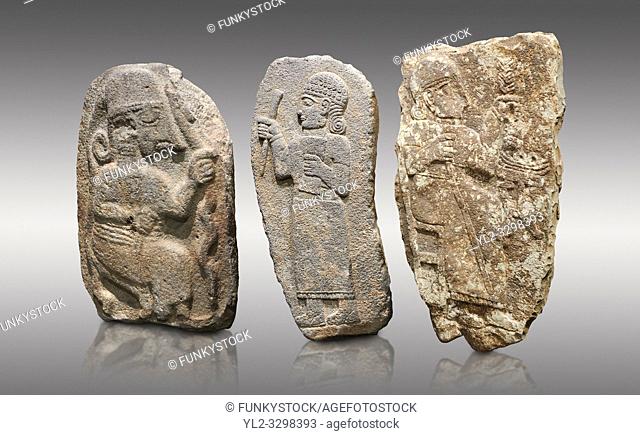Hittite monumental relief sculptures, 900 - 700 BC, from Adana Archaeology Museum, Turkey. Against a grey background