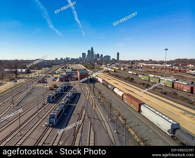 View of a train yard with the city of Charlotte, NC in the background