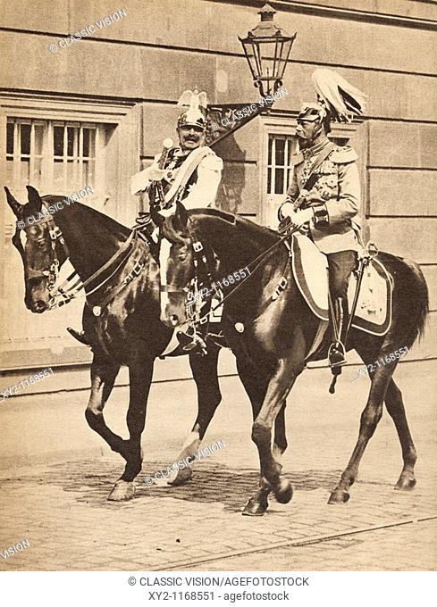 King George V and Kaiser Wilhelm II leaving Potsdam to attend a review of the troops in 1913  George V, 1865 to 1936  King of England and Emperor of India...