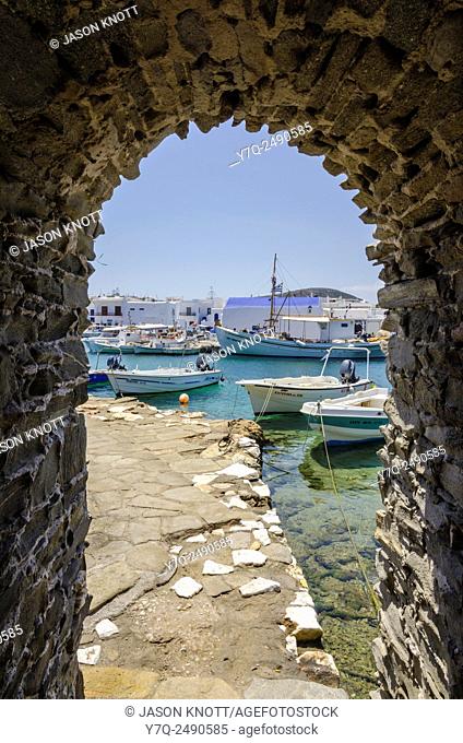 Framed views through the Venetian Kastro tower on the waterfront of Naoussa Town, Paros Island, Cyclades, Greece