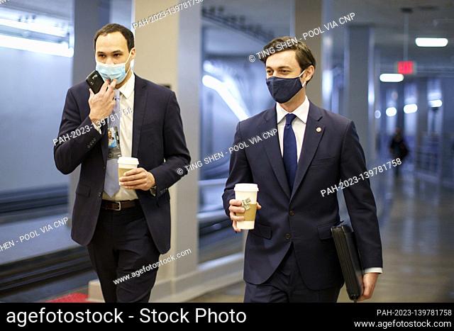 Senator Jon Ossoff, a Democrat from Georgia, wears a protective mask while walking through the Senate Subway at the U.S. Capitol in Washington, D.C