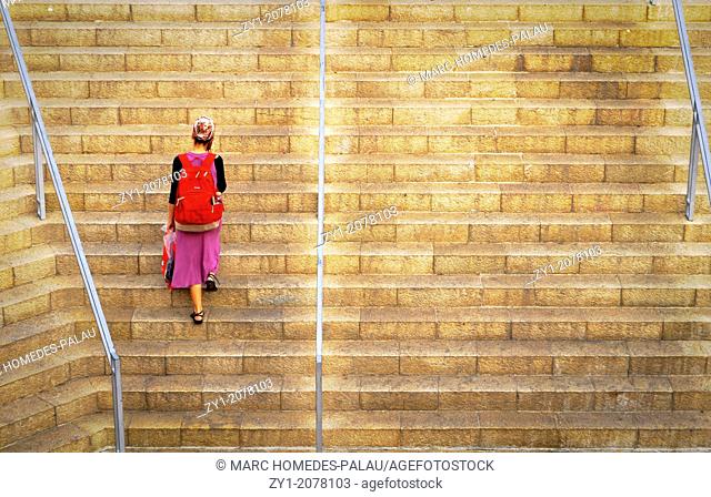 Young girl climbing stairs in Mamilla's new shopping Street Jerusalem