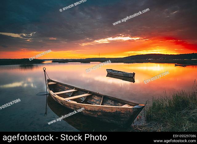 Braslaw Or Braslau, Vitebsk Voblast, Belarus. Wooden Rowing Fishing Boats In Beautiful Summer Sunset On The Dryvyaty Lake