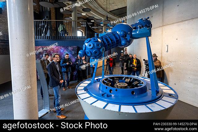 PRODUCTION - 27 March 2023, Saxony-Anhalt, Halle (Saale): The retired projector of the old planetarium is on display in the foyer of the new planetarium