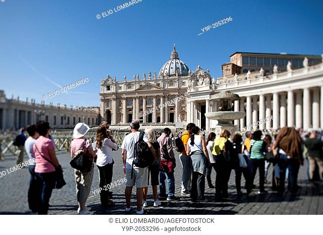 Faithfuls in a Row in Saint Peter's Square. Vatican City. Rome. Italy