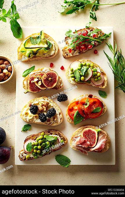 Various bruschettas with toppings