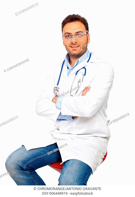 Handsome young doctor isolated on white