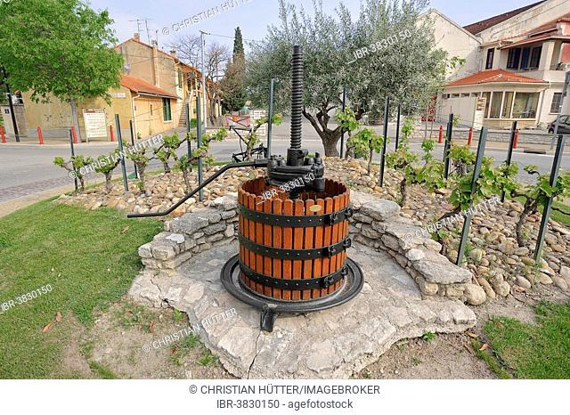 Old wine press in a roundabout, Noves, Bouches-du-Rhône, Provence-Alpes-Cote d'Azur, Southern France, France
