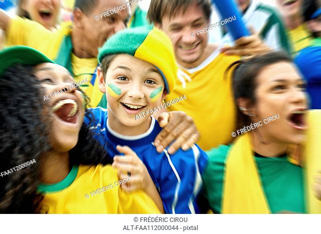Brazilian football fans watching football match