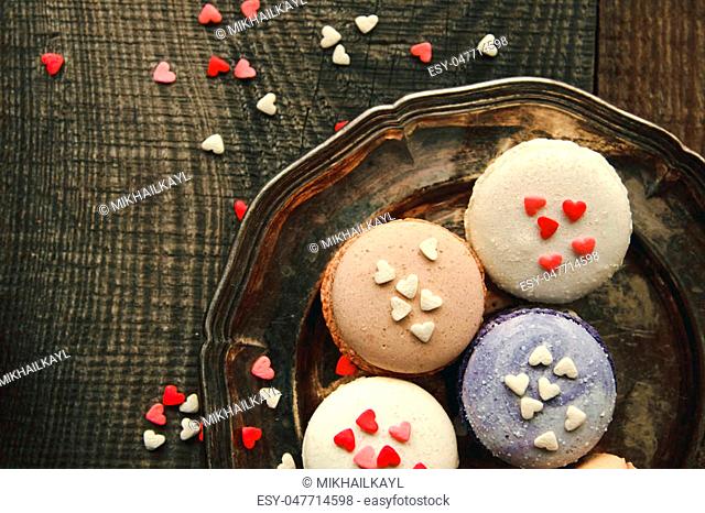 Beautiful and delicate background for Valentine's day and 8 March with macaroons and hearts