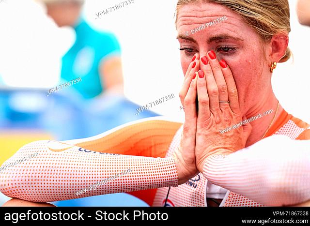 Dutch Demi Vollering looks tired after crossing the finish line at the elite women time trial race at the UCI World Championships Cycling, in Glasgow, Scotland