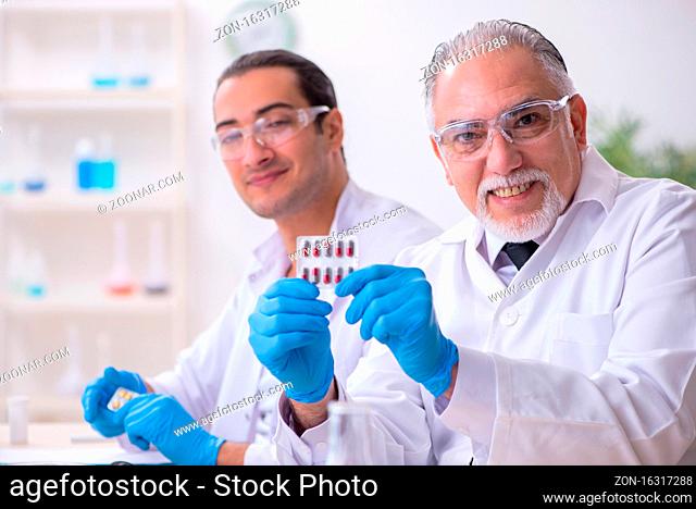 Two chemists working in the laboratory