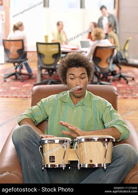 Young man playing drums