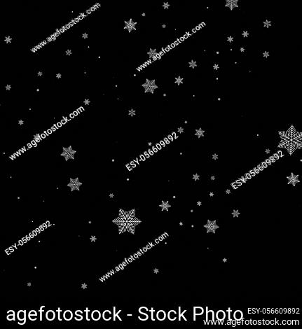 Realistic falling snowflakes isolated on black background