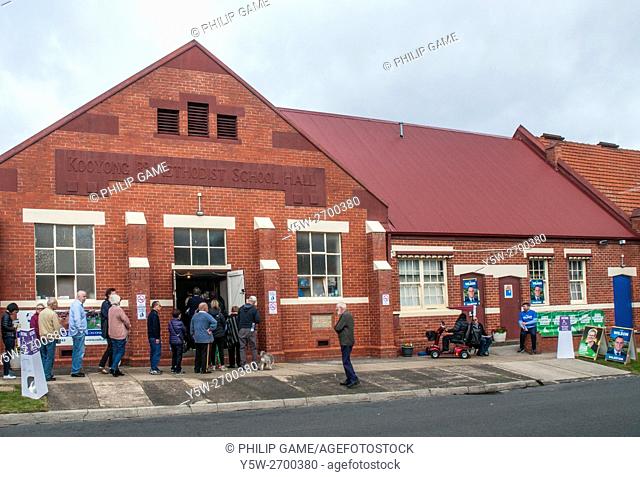 Australian citizens line up in suburban Melbourne to vote in the national election, 2 July 2016. Voting is compulsory. The election was triggered by a double...