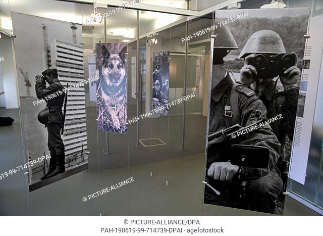 31 May 2019, Saxony-Anhalt, Marienborn: Historical photos in the permanent exhibition at the German Partition Memorial in Marienborn