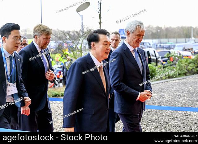 King Willem-Alexander of The Netherlands and President Yoon Suk Yeol of South Korea at ASML Hoofdkantoor Veldhoven, on December 12, 2023